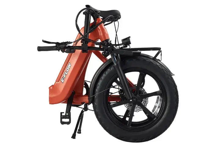 YOUNG Electric E-Flow 750W Folding eBike Orange electric bike with black wheels on a white background. YOUNG Electric E-Flow 750W Folding eBike