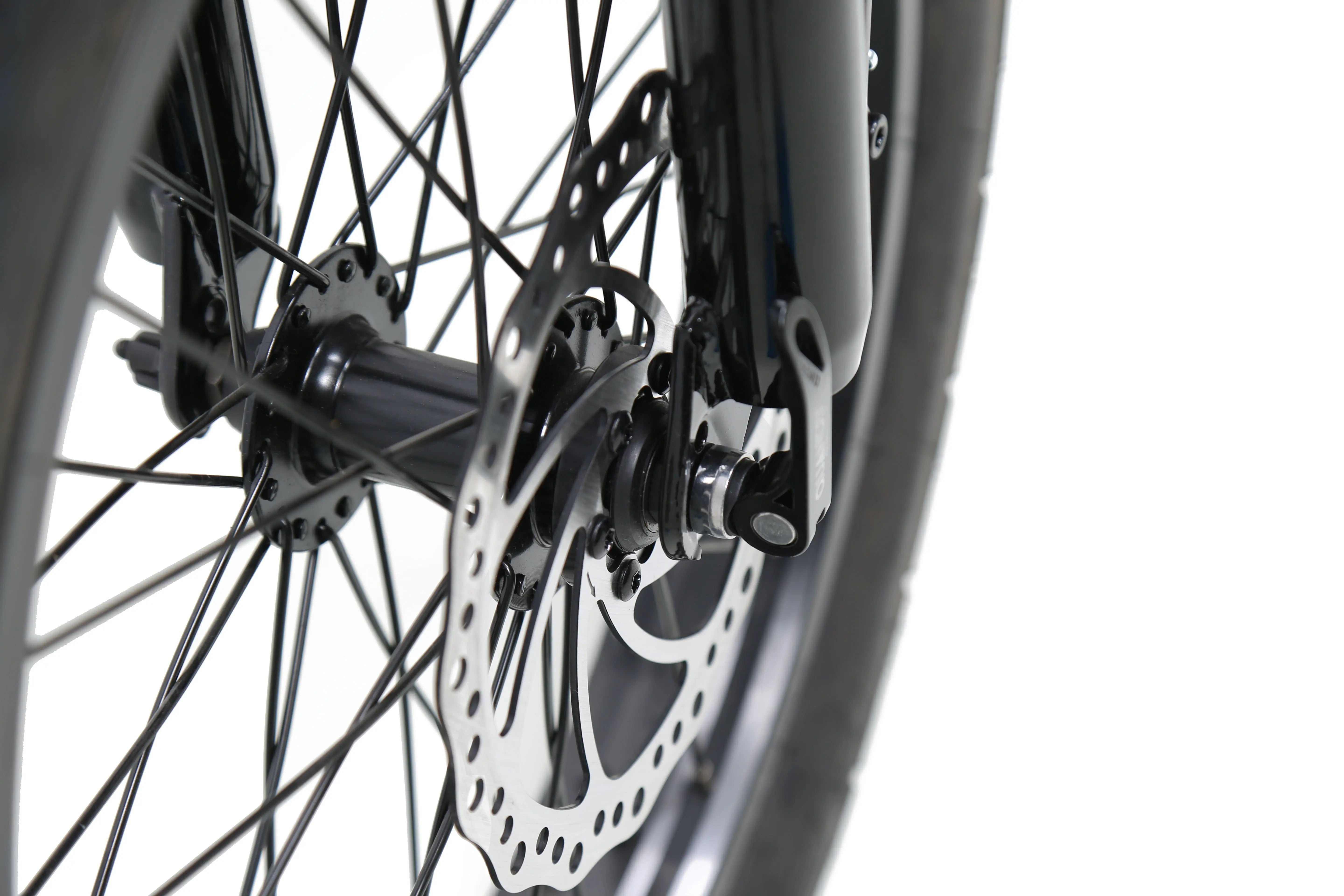ACE Utility Cruiser EBike Close-up of a bicycle wheel with disc brake system on a white background. ACE Utility Cruiser EBike