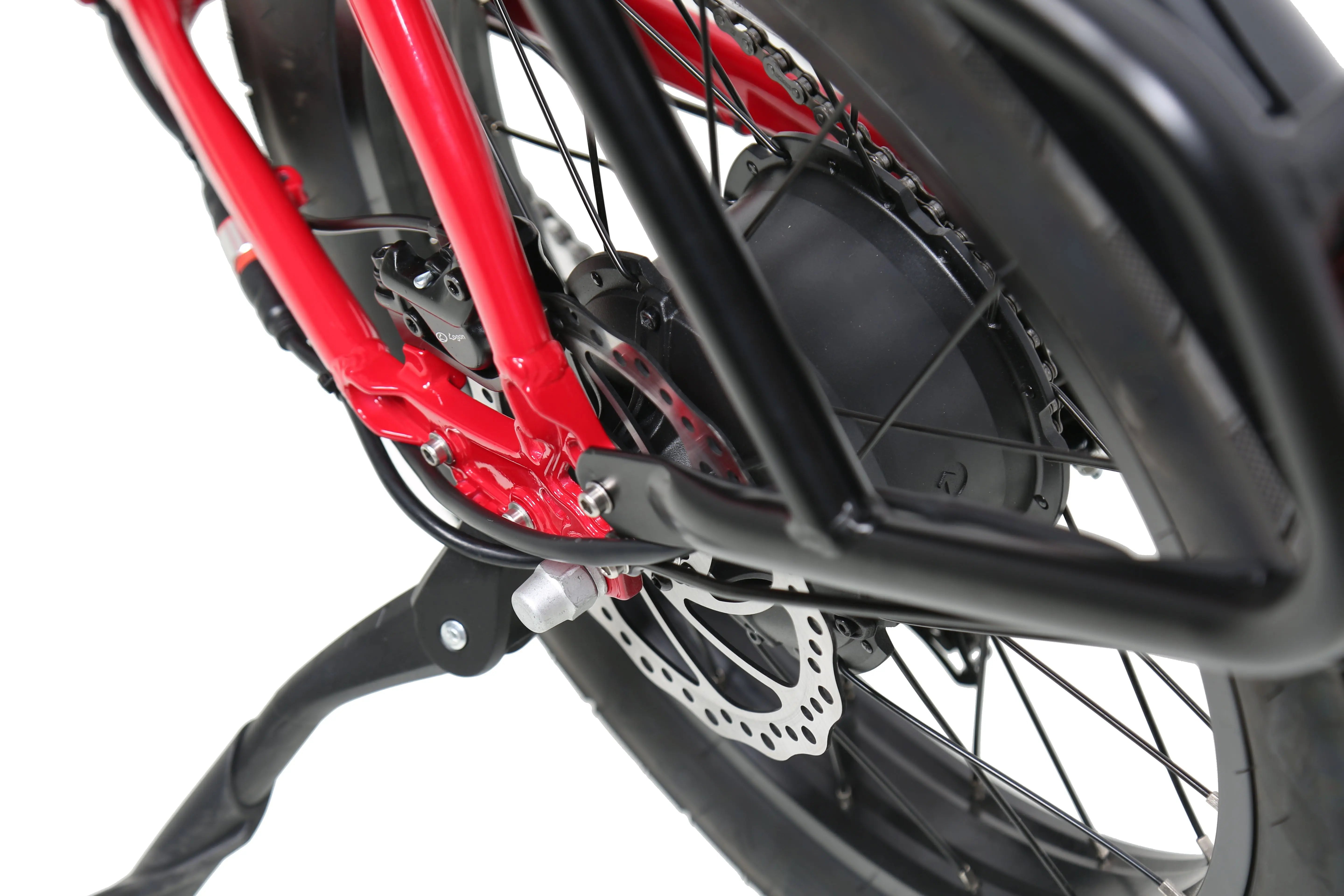 ACE Utility Cruiser EBike Close-up of a bicycle wheel with red frame and black fender on a white background. ACE Utility Cruiser EBike