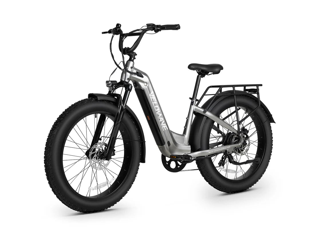 Velowave Ranger Step-Thru 3.0 Torque Sensor Electric Bike Electric bike with black tires and silver frame on a white background. Valowave Ranger Step-Thru 3.0 Torque Sensor Electric Bike