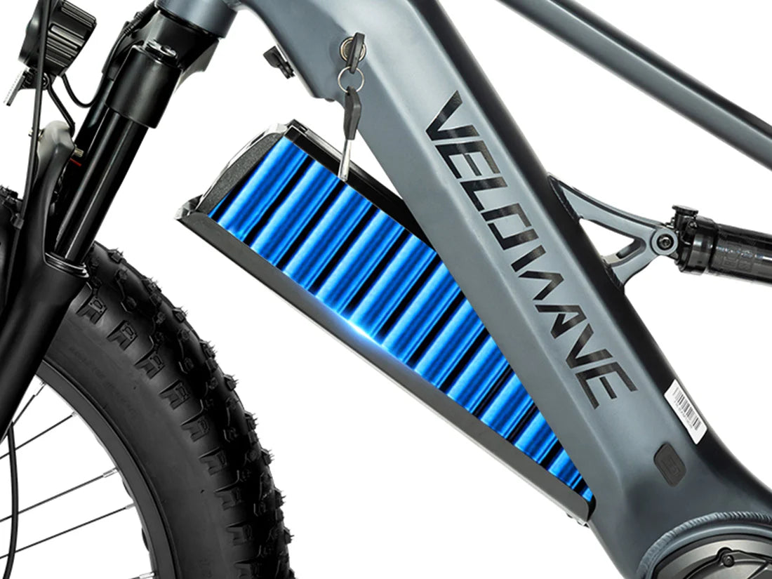 Velowave Brawny XM MTB Mountain Electric Bike Gray electric bike with blue battery pack and 'Velowave' branding on a white background. Valowave Brawny XM MTB Mountain Electric Bike