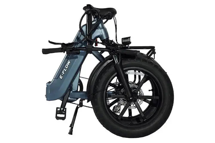 YOUNG Electric E-Flow 750W Folding eBike Blue electric bike with black tires on a white background. YOUNG Electric E-Flow 750W Folding eBike