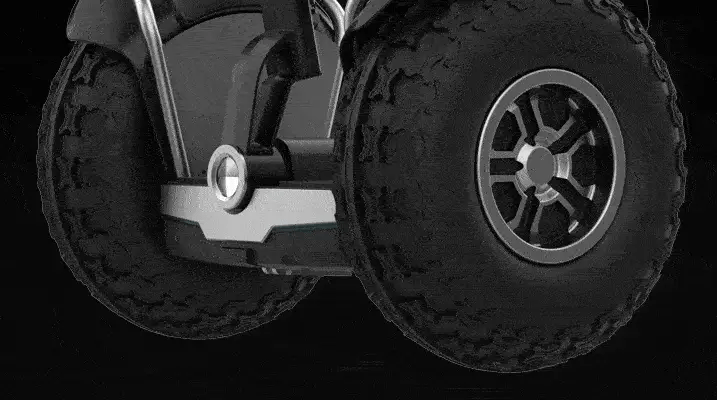 Freego X60 Plus Multifunctional Off-Road Balance Scooter Close-up of a wheel with tread pattern on a black background. Freego X60 Plus Multifunctional Off-Road Balance Scooter