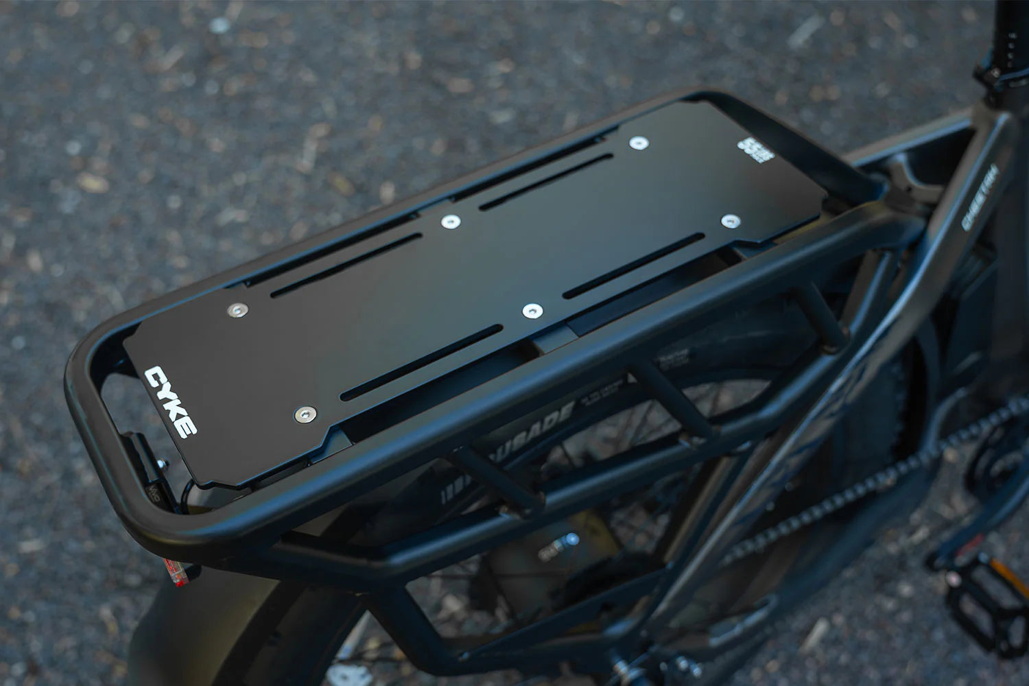 CYKE Cheetah Hunting EBike Bicycle rack with a black tray attached, featuring the brand 'CYKE'. CYKE Cheetah Hunting EBike