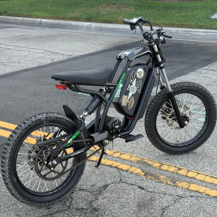 Freego Nova 3 Mid-Drive All-Terrain Dirt eBike Black electric bike on a road with visible . Freego Nova 3 Mid-Drive All-Terrain Dirt eBike
