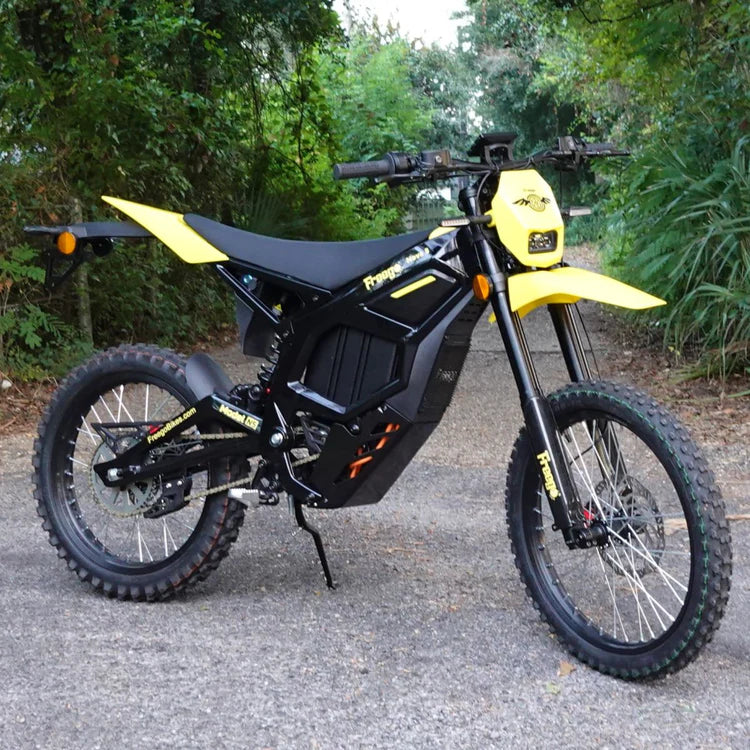 Freego Nova 5 Mid-Drive Off-Road Electric Dirt Bike Yellow and black electric bike on a paved road with greenery in the background. Freego Nova 5 Mid-Drive Off-Road Electric Dirt Bike