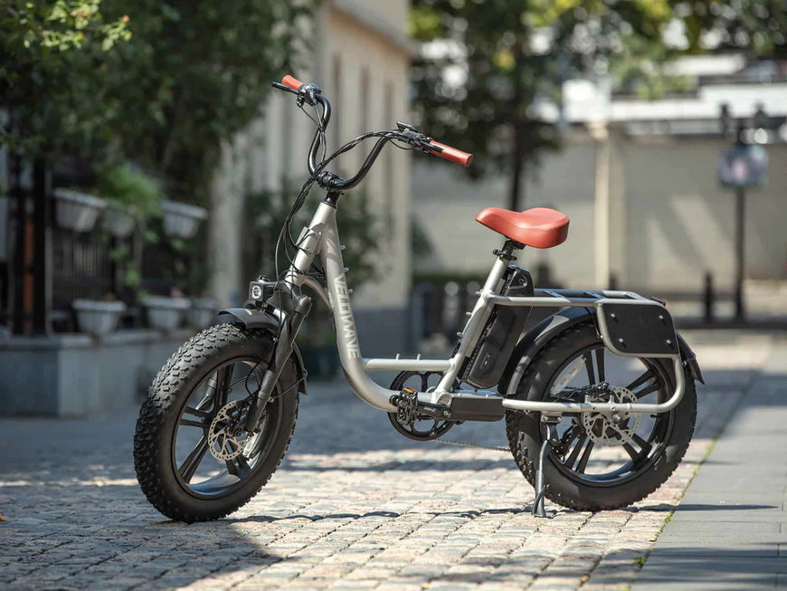 Electric bike on a paved street with blurred background. Valowave Prado S Commuter Electric Bike