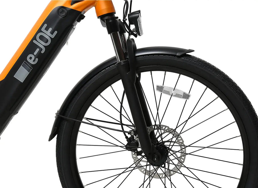 Close-up of an e-bike wheel with 'e-JOE' branding on a white background. JADE Step Through Commuter Ebike