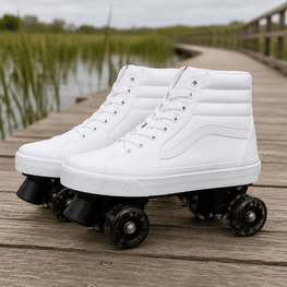 A pair of white high-top roller skates with black wheels, positioned on a wooden boardwalk with a marshland background.