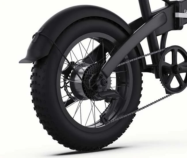 Close-up of a black electric bike wheel on a white background. Freego eFlex Raptor E1 Shimano 7-Speed Foldable Fat Tire City Electric Bike