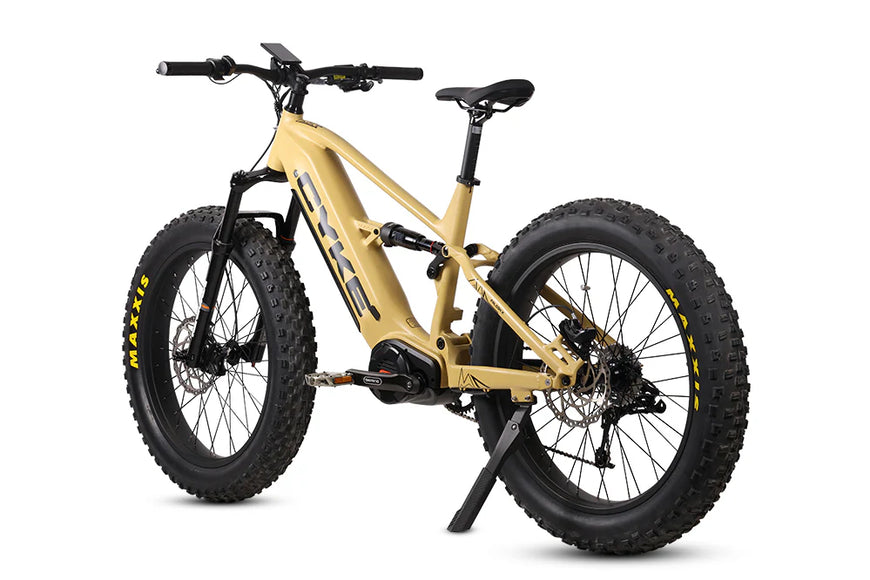 Gold electric bike with thick tires on a white background. CYKE Falcon X Full Suspension EBike