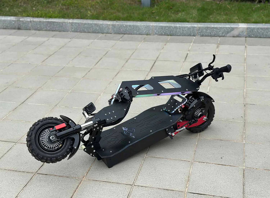 Black electric scooter with large wheels on a tiled pavement. Freego D11 Landtiger Electric Scooter Foldable Dual Motor 4000W