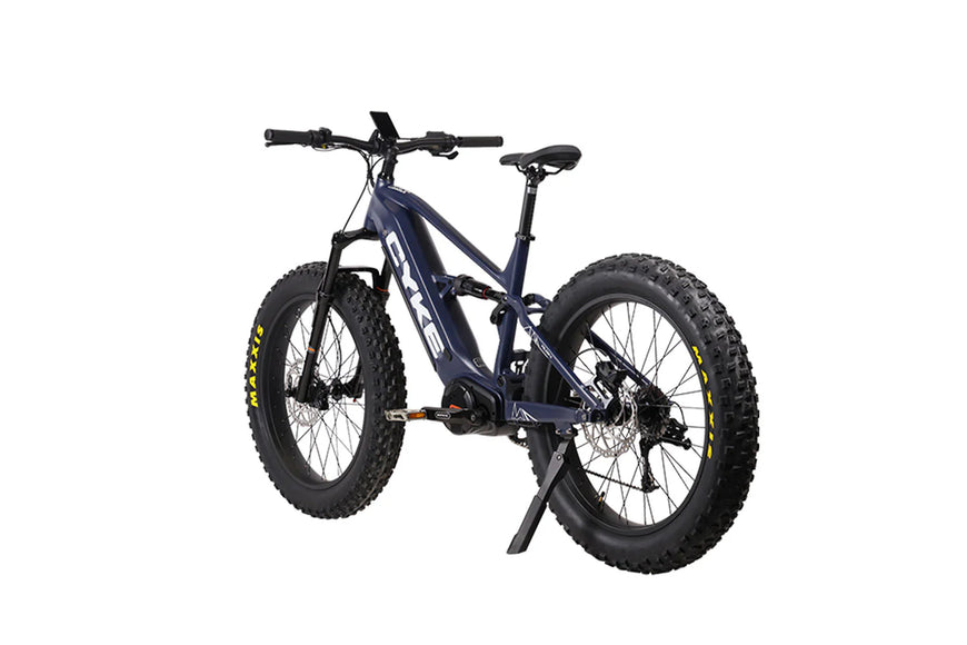 Fat-tire bicycle on a white background. CYKE Falcon X Full Suspension EBike