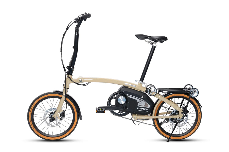Beige and black electric bike on a white background. CYKE Kingfisher Mid-Drive Folding eBike