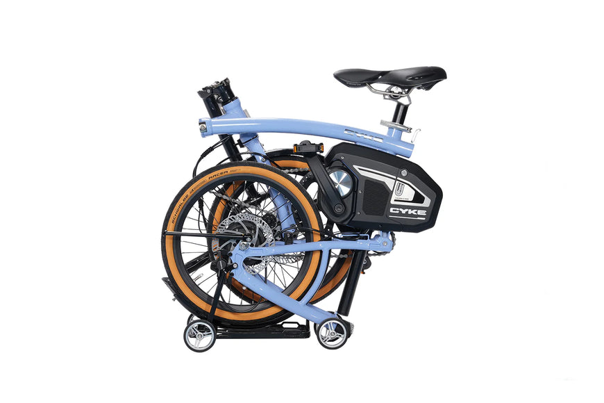 Foldable bicycle with a white background. CYKE Kingfisher Mid-Drive Folding eBike