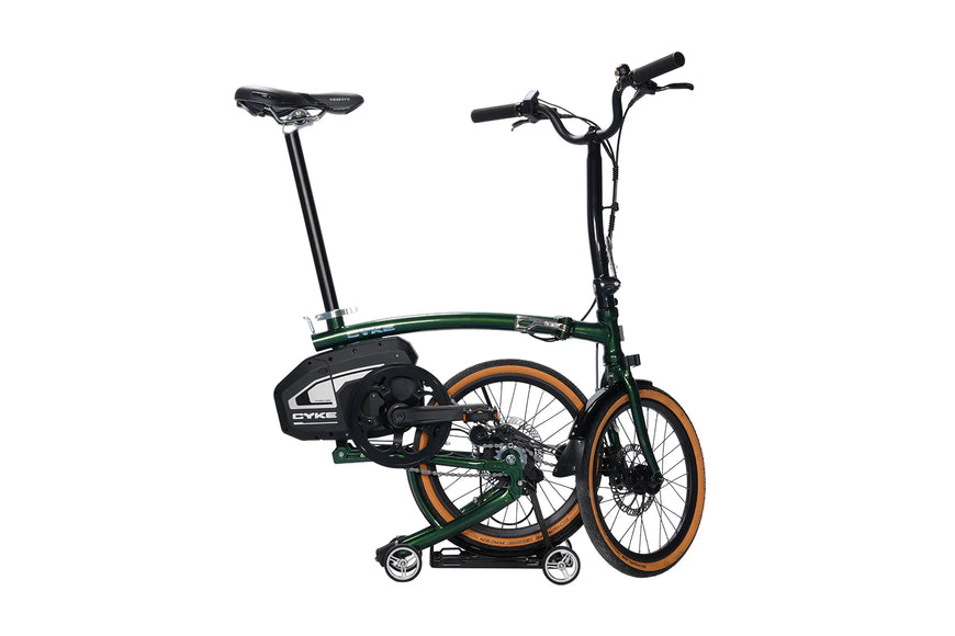 Foldable bicycle with a green frame on a white background. CYKE Kingfisher Mid-Drive Folding eBike