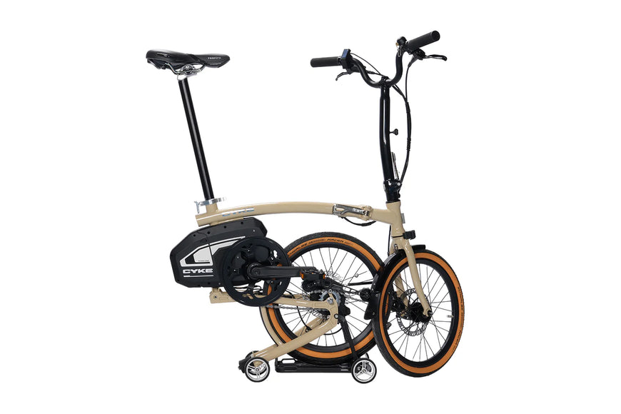 Foldable bicycle on a white background. CYKE Kingfisher Mid-Drive Folding eBike