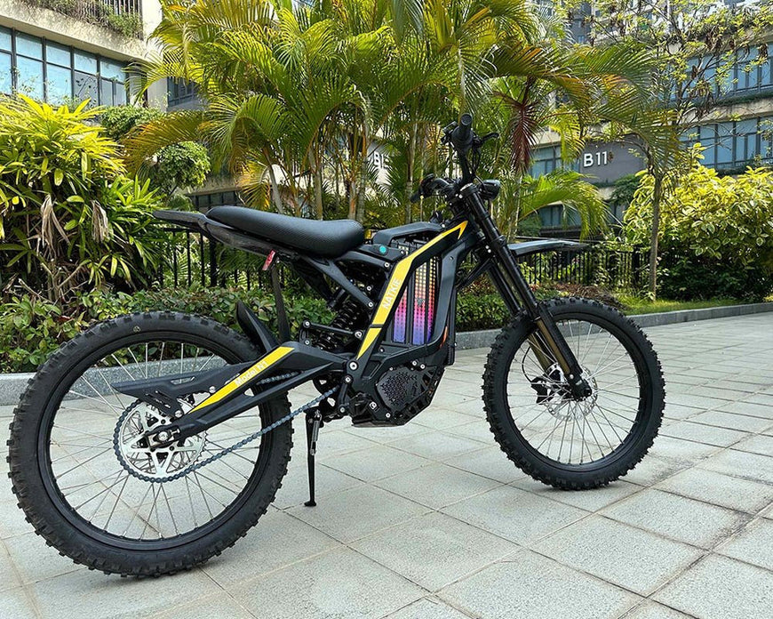 Electric bike on a paved path with greenery in the background. Natkie N1 All-Terrain Electric Motorcycle