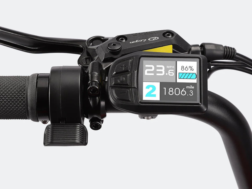 Digital display on a bicycle handlebar with various readings. Valowave Pony Compact Step-Thru Electric Bike