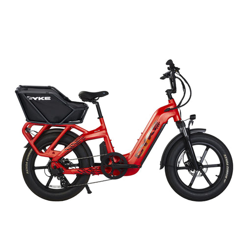 Red electric bike with a black basket on a white background. COLLIE Cargo EBike