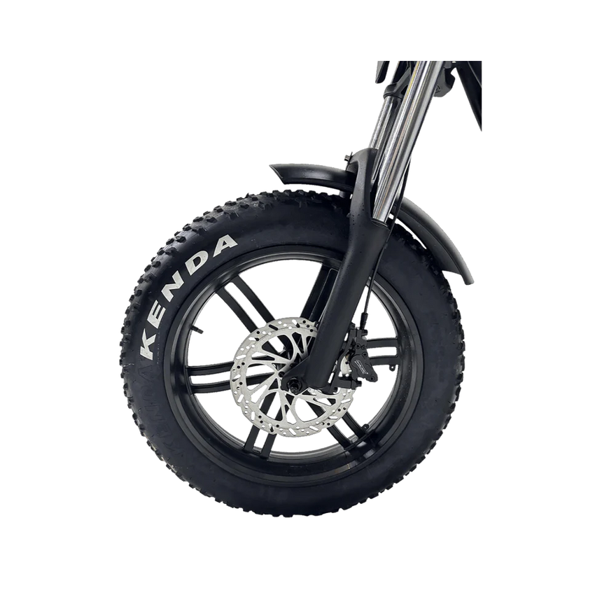 Close-up of a Kenda tire on a white background. Freego Shotgun F2 Pro Max Prime Fat Tire E-Bike